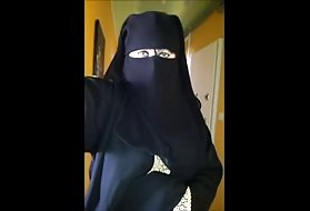 Teen bitch sits on the floor and passionately jerks her pussy with fingers